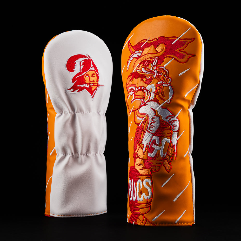 Tampa Bay Buccaneers driver cover with a captain on barrels that say “go” “bucs” and a flag in the rain. 