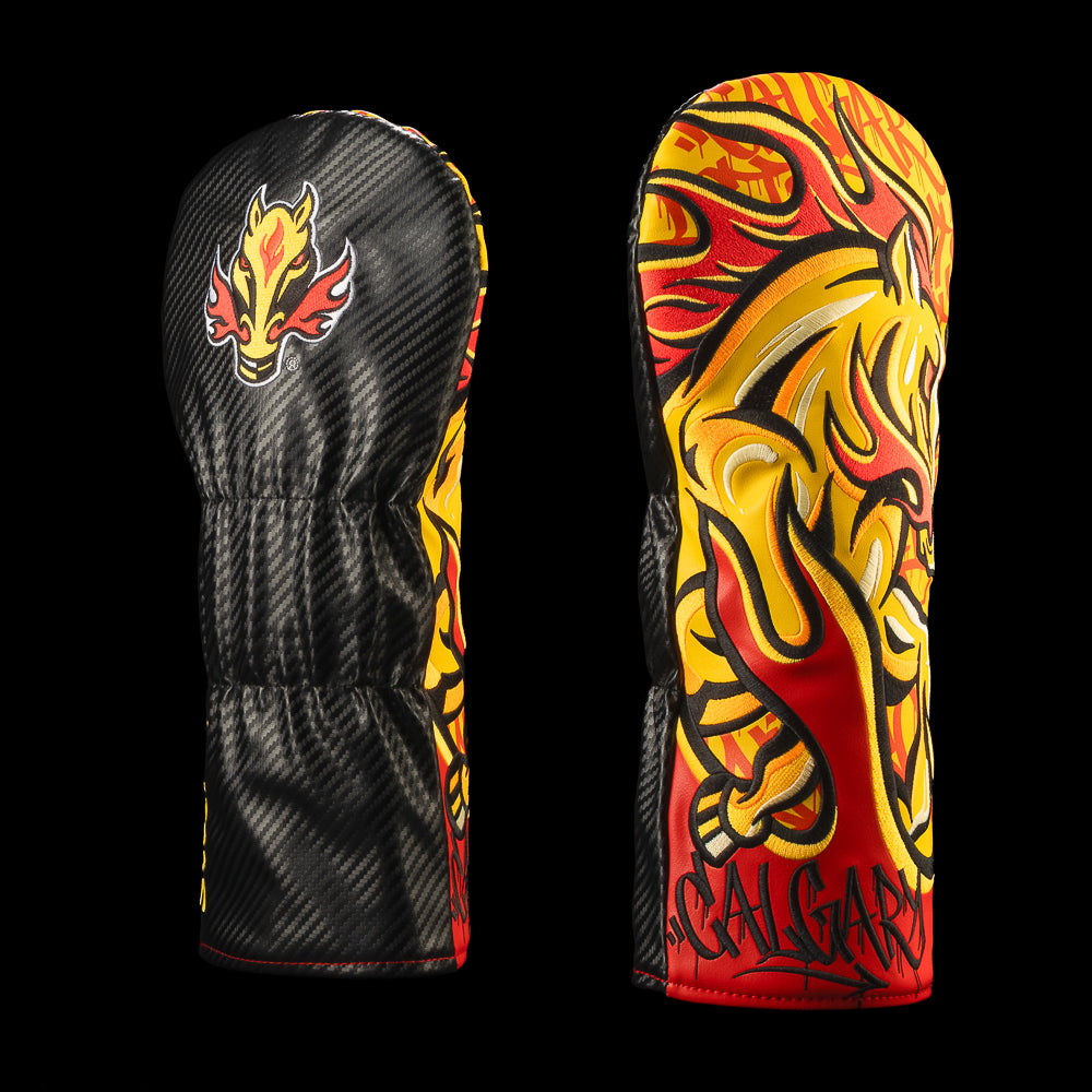 Black Calgary Flames driver cover with a red, orange and yellow flaming horse graphic and Calgary graffiti lettering.