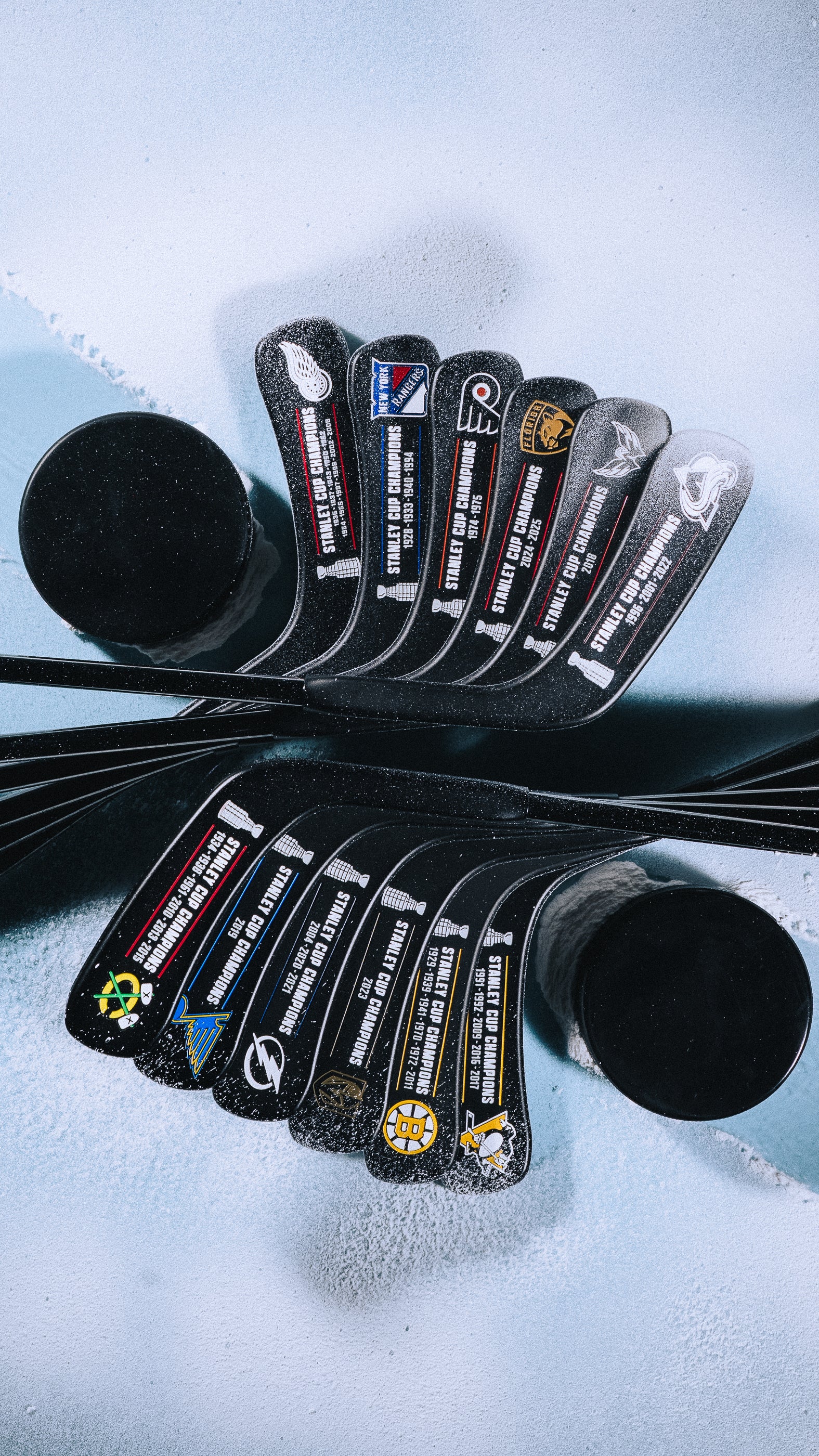 SWAG x NHL official hockey team blade putters with a black nano coating and matching headcover.