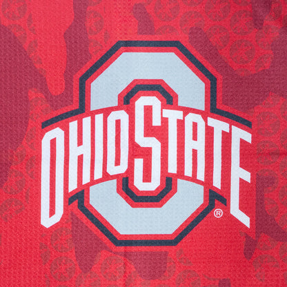 Red golf towel with Ohio State logo and cartoon character on a black background