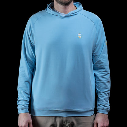 SWAG Golf x Peter Millar sky blue performance hoodie with 8-bit skull and game over embroidery on the left sleeve. 