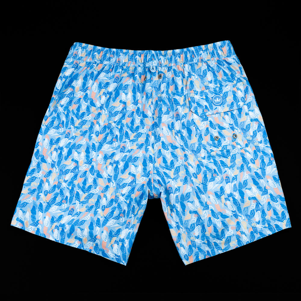 Flip the Bird Orange Skull with blue parrots pattern swim trunks.