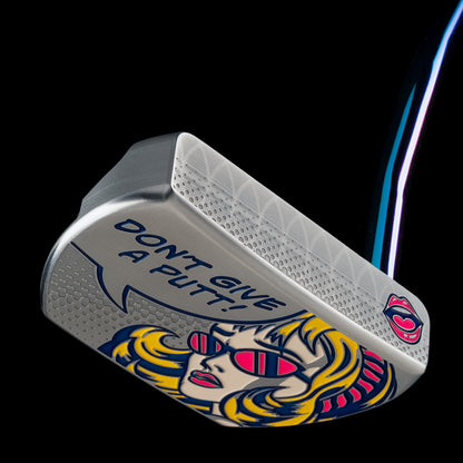 Colorful pop art inspired mid-mallet golf limited edition putter with a design of a woman's face and sunglasses, featuring the text 'Don't Give a Putt!'.
