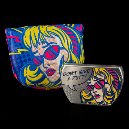 Colorful pop art inspired mid-mallet golf putter and cover with a design of a woman's face and sunglasses, featuring the text 'Don't Give a Putt!'.