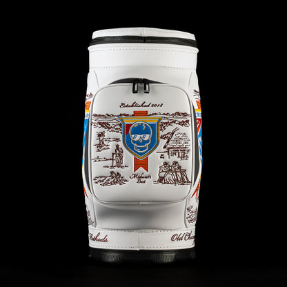 Back view of the Old SWAG Den Caddy Cooler featuring a zippered white pocket with a blue skull shield, brown Chicago illustrations, “Established 2018” and “Midwest’s Best” embroidery.