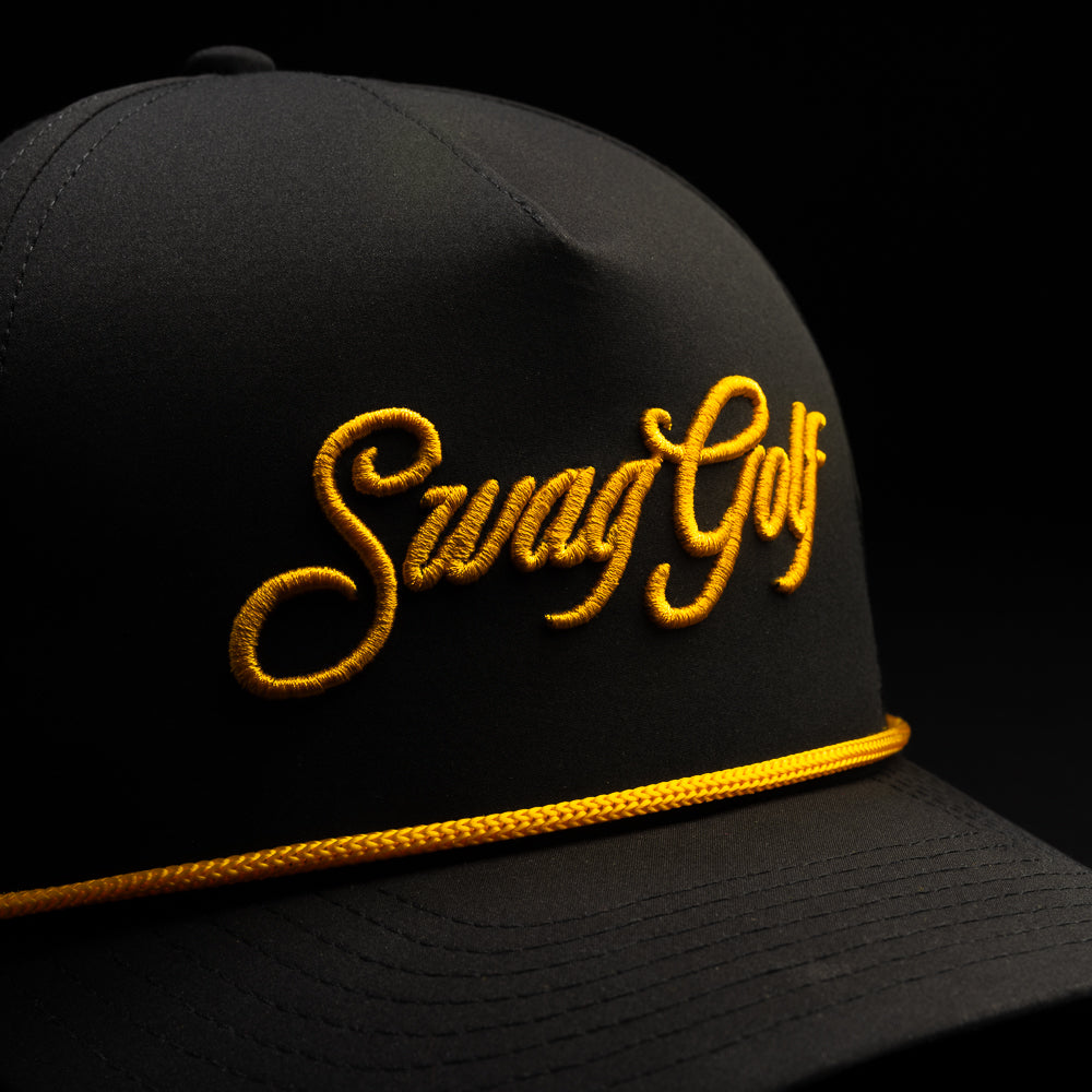 Black Swag Royal King golf hat with gold lettering. 