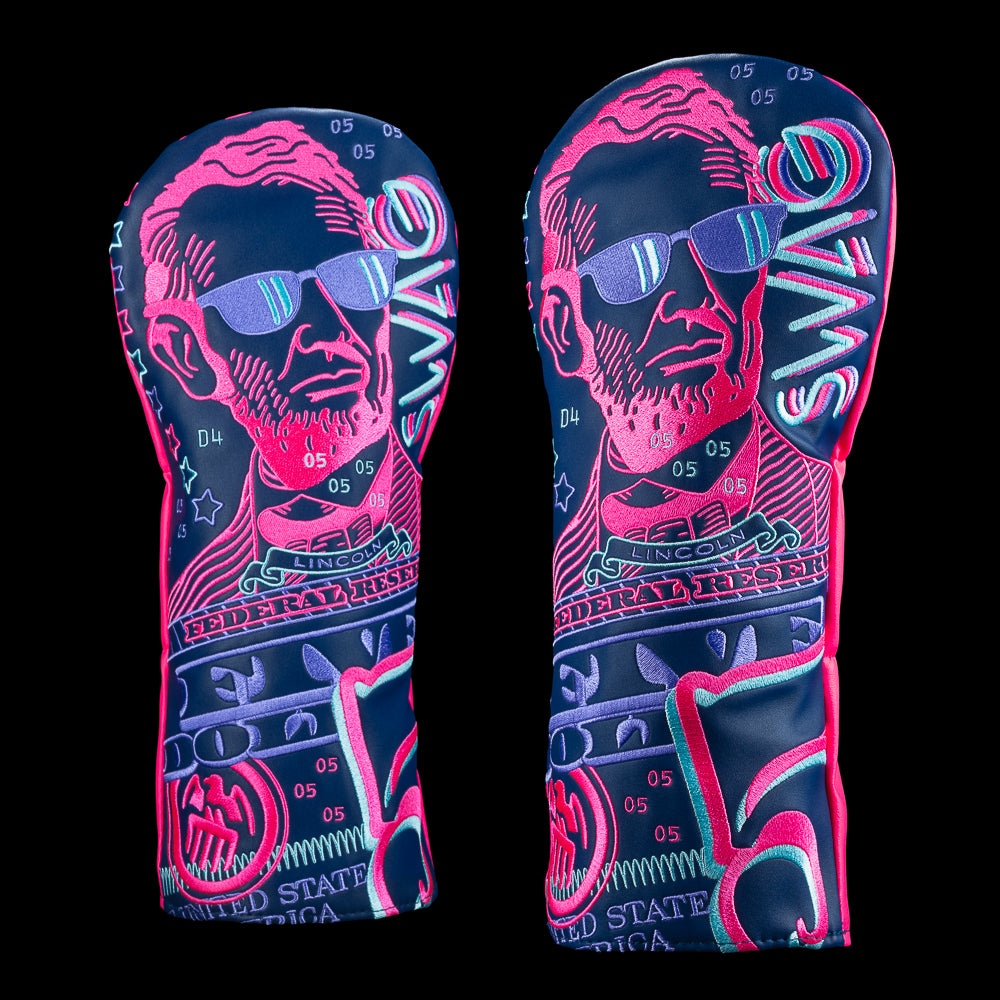 SWAG Golf Gigantic Lincoln driver cover with oversized Lincoln artwork and neon pink and blue currency graphics.