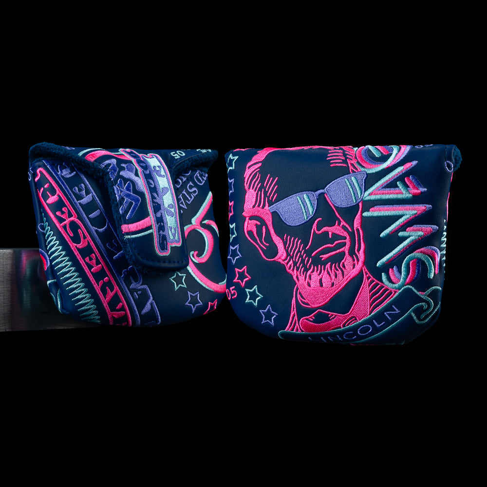 SWAG Golf Gigantic Lincoln mallet cover with oversized Lincoln artwork, neon currency graphics, and SWAG branding.