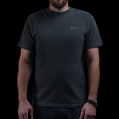 SWAG Golf Glitched Out Benji short sleeve t-shirt featuring small SWAG logo on left chest in pink and gray glitch detail.