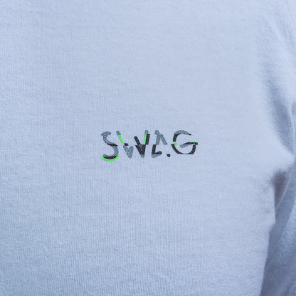 Close-up of SWAG logo on white Glitched Out Benji t-shirt in green and gray detail with glitch styling.