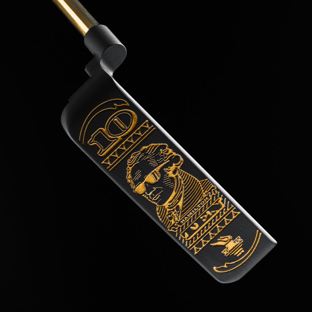 Swag Broadway Hamilton Handsome One Lefty black and gold $10 themed limited -release blade golf putter made in the USA.