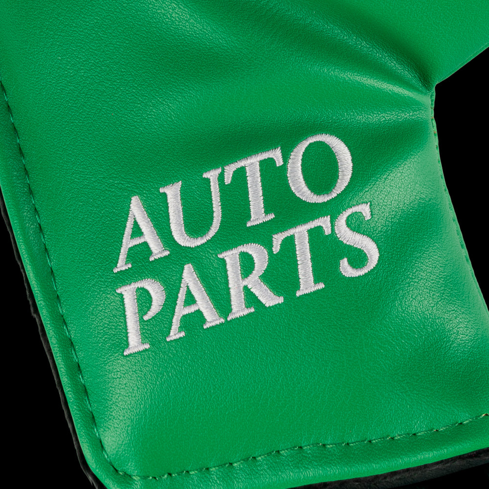Green Callahan Auto Parts blade putter cover with logo.