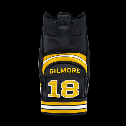 Rewind Golf x Happy Gilmore 18 Hockey Jersey official desk caddy accessory featuring black, gold, and yellow details and Happy Gilmore logo.