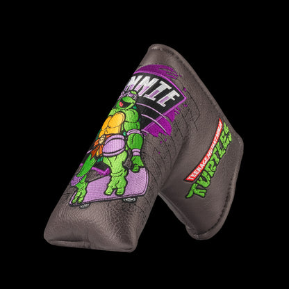 TMNT Donnie blade putter cover featuring bold purple and brick details. A classic Teenage Mutant Ninja Turtles Turtle Power style.