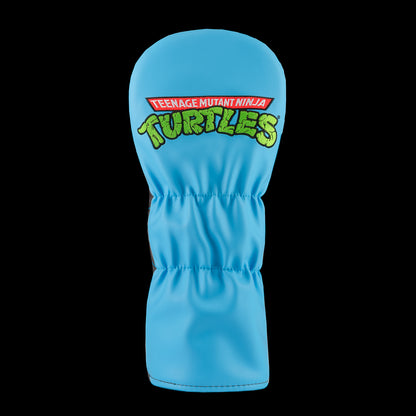 Blue TMNT Leo driver cover with swords and city backdrop.