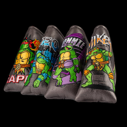 TMNT Leo blade putter cover with swords and blue cityscape detailing.