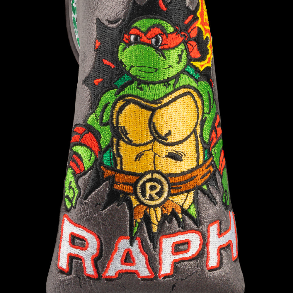 TMNT Raph blade putter cover with red details and sai weapons.