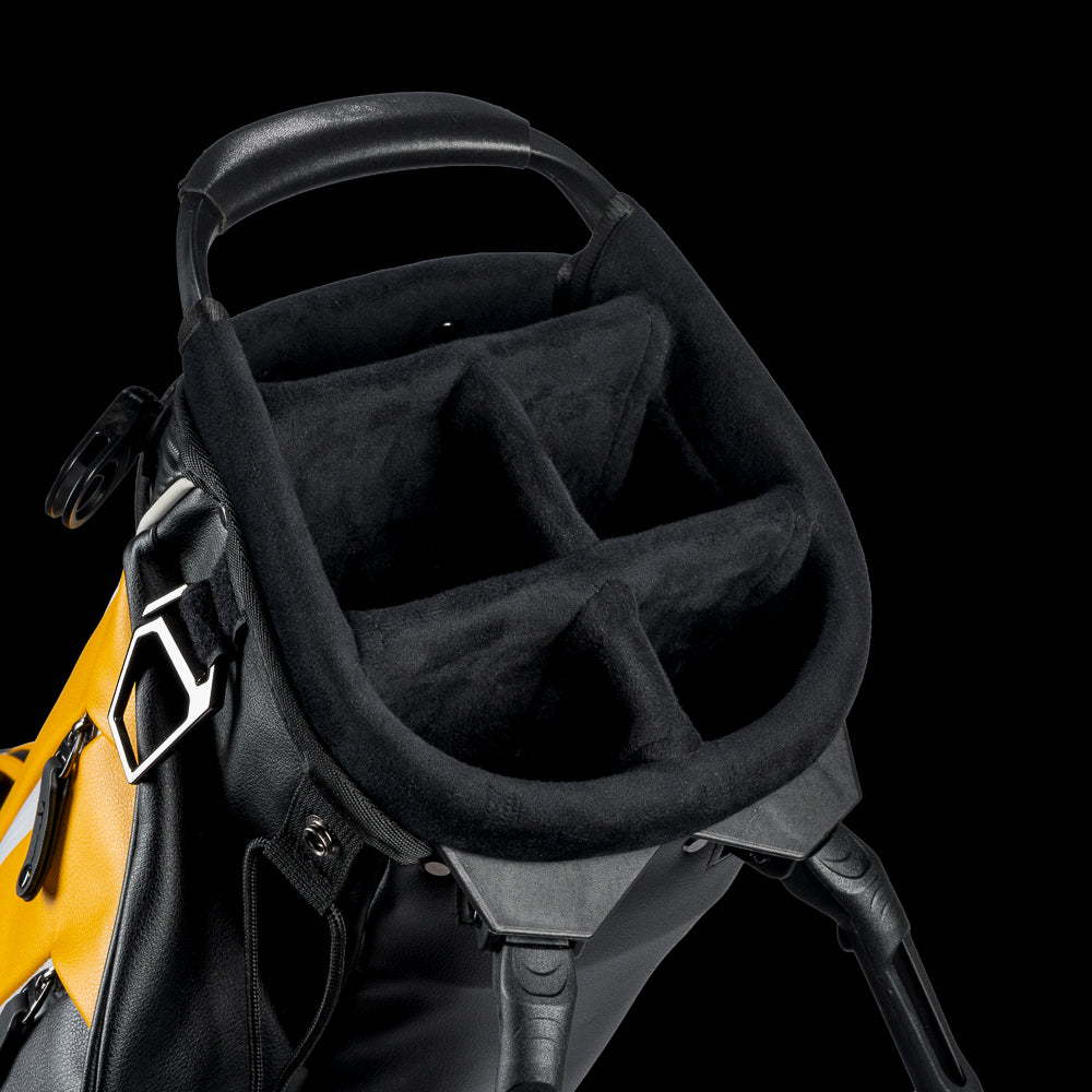 Yellow and black golf bag with 'Gilmore' branding on a white background