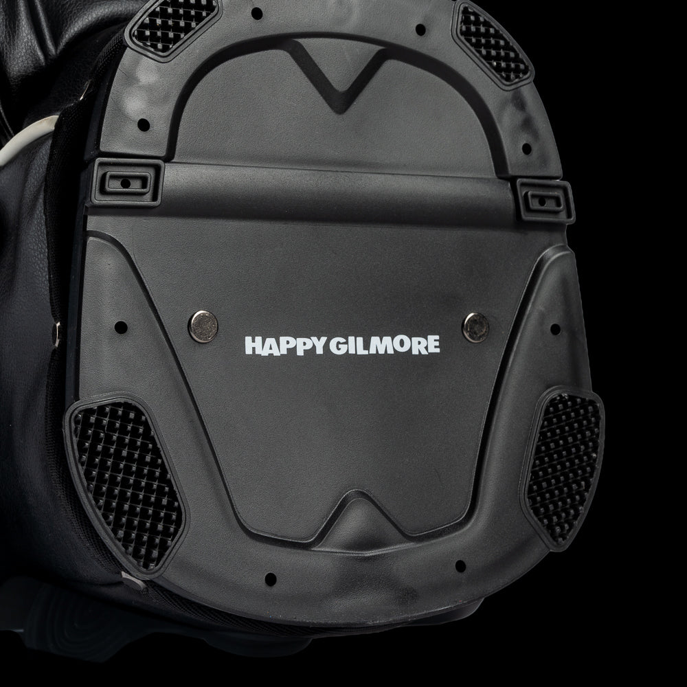 Yellow and black golf bag with 'Gilmore' branding on a white background