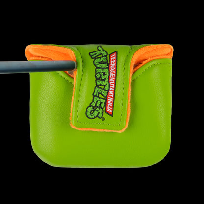 Green TMNT Mikey mallet cover with orange mask peeking design.