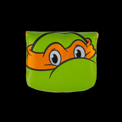 Green Mikey small center shaft mallet cover with orange mask peeking design.
