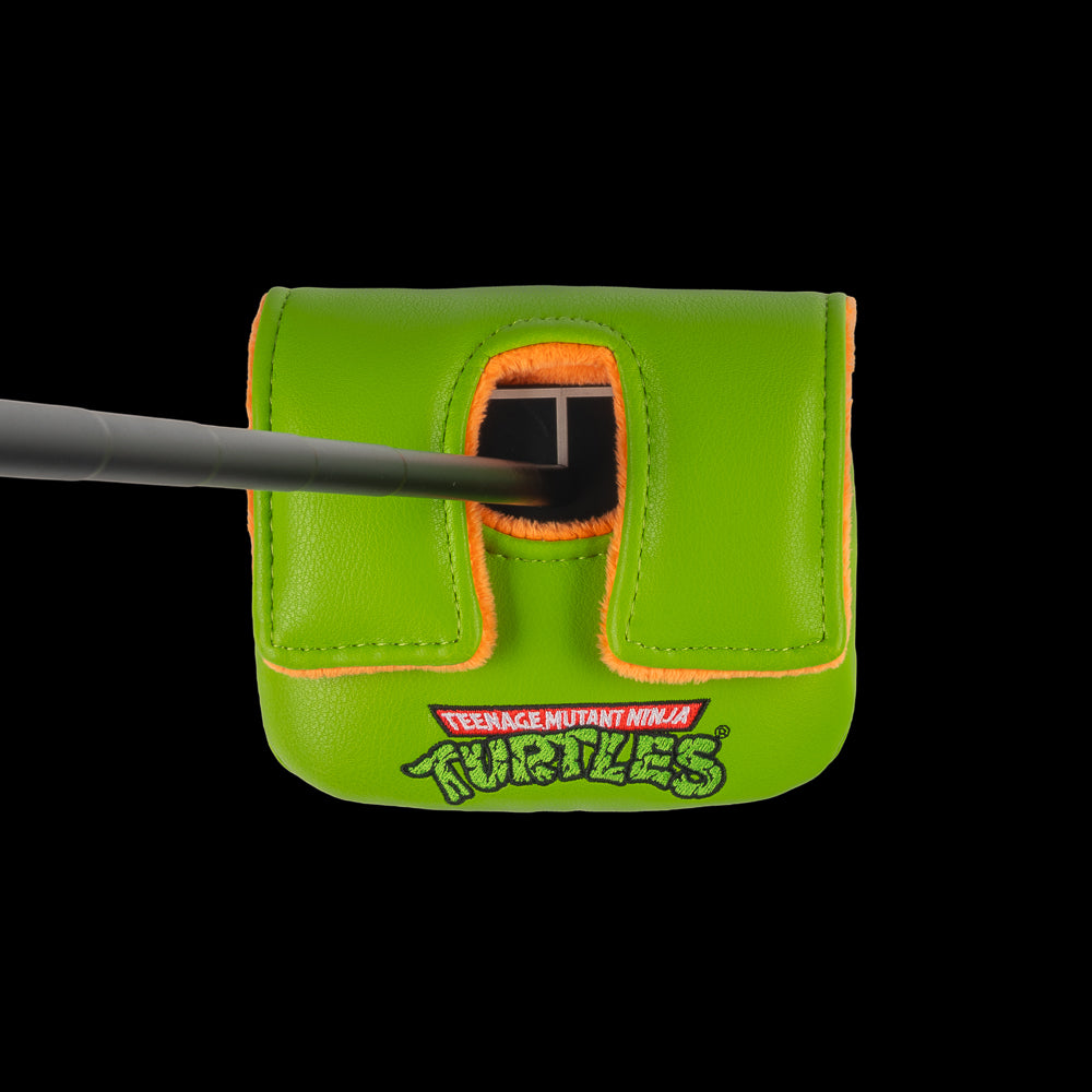 Green Mikey small center shaft mallet cover with orange mask peeking design.