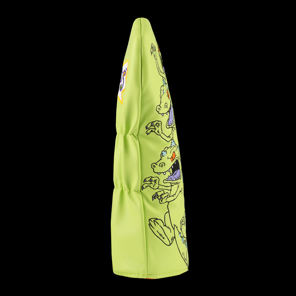 Green Rugrats Reptar driver cover with stacked cartoon Reptar design holding a building, bold Rewind Golf headcover style.