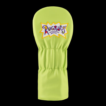 Green Rugrats Reptar driver cover with stacked cartoon Reptar design holding a building, bold Rewind Golf headcover style.