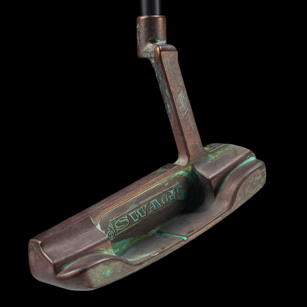 SWAG Gold Lady Liberty Handsome One left handed golf putter with unique copper plated patina finish and handpainted details.