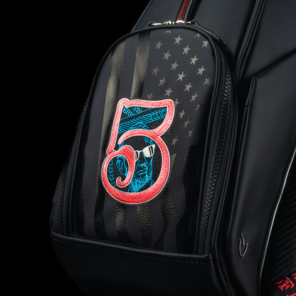 SWAG Golf USA 2025 Lincoln dollar bill themed Vessel black stand bag with currency themed embroidery.