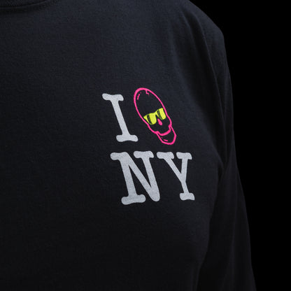 Person wearing a black long-sleeve t-shirt with 'I Skull NY' graphic design on a black background.