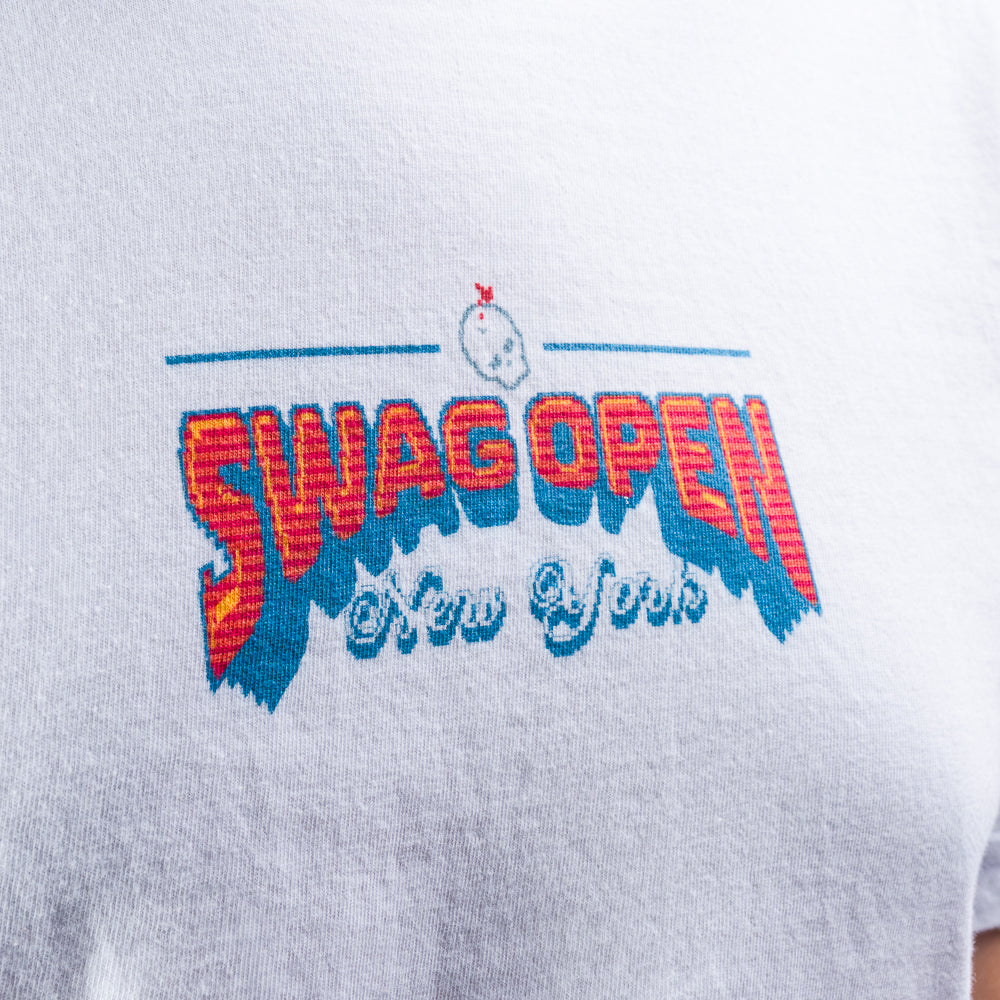 White SWAG Open New York short sleeve t-shirt with colorful graphic design on a black background.