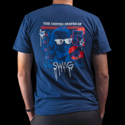 Person wearing a blue t-shirt with a United States of SWAG logo on a black background