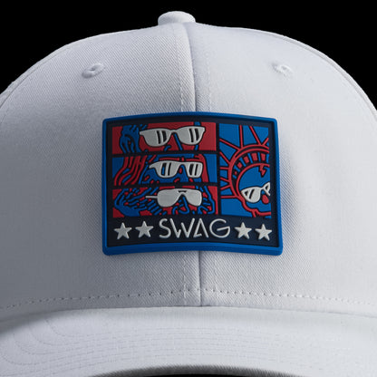 White cap with a colorful patch featuring sunglasses and the word 'SWAG' on a black background