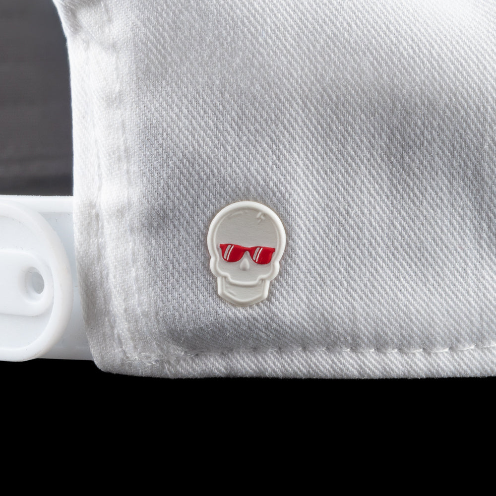 White cap with a colorful patch featuring sunglasses and the word 'SWAG' on a black background