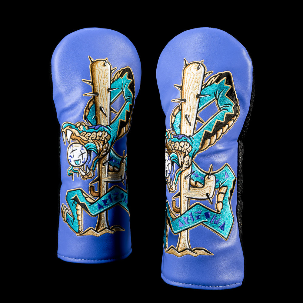 SWAG Golf Arizona Diamondbacks fairway cover featuring a teal rattlesnake wrapped around a cactus, a dangling baseball, desert rope details, and an embroidered "Arizona" banner on a purple and black design.