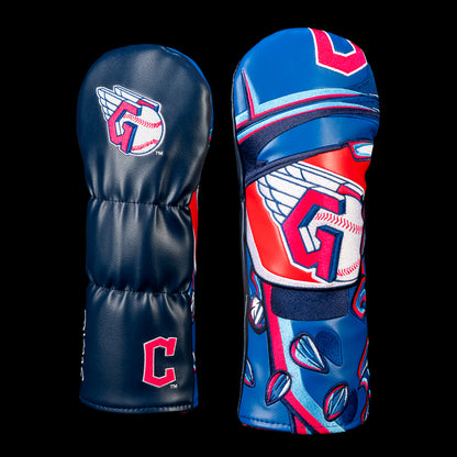 SWAG Golf Cleveland Guardians fairway cover shown front and back with an embroidered winged Guardians "G" logo on the reverse and artwork featuring a winged "G" set inside a baseball beneath a batting helmet in navy and red.