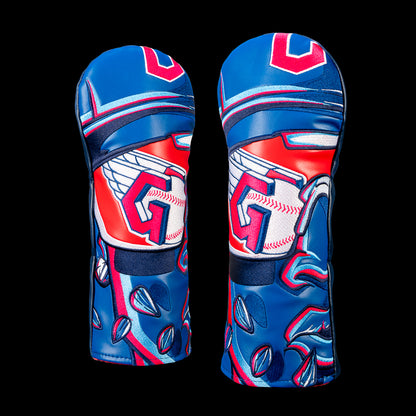SWAG Golf Cleveland Guardians fairway cover featuring a winged Guardians "G" set inside a baseball beneath a batting helmet with layered wing graphics and bold navy and red accents.