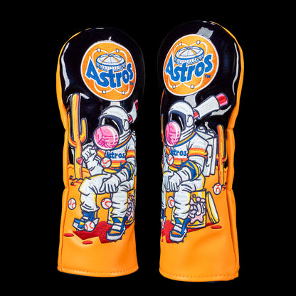 Houston Astros fairway cover featuring a retro astronaut relaxing on a cooler with bats, baseballs, and vintage Astros graphics beneath a classic Astros logo in orange and blue.
