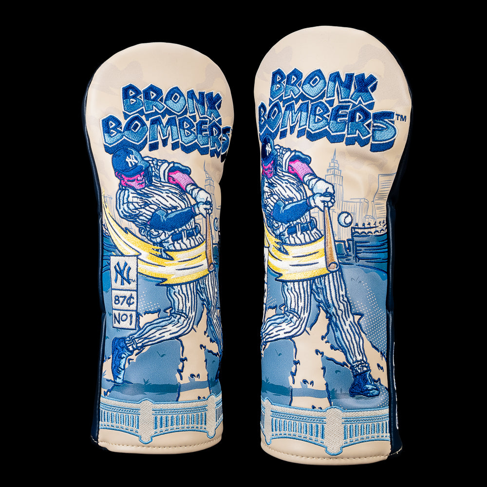 SWAG Golf New York Yankees fairway cover featuring a comic-style Yankees batter in pinstripes beneath bold "BRONX BOMBERS" lettering, with a New York skyline, yellow swing trail, flying baseball, and vintage 87¢ subway sign.