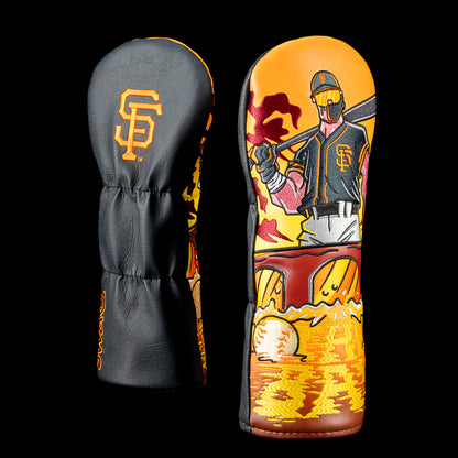 SWAG Golf San Francisco Giants fairway cover shown front and back with the classic interlocking "SF" logo on the back and an Giants batter standing over McCovey Cove with the Bay Bridge, baseballs, and a golden sunset.