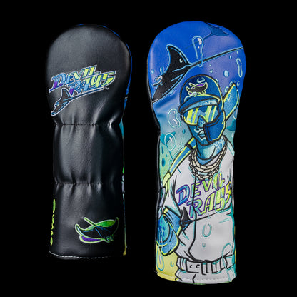 SWAG Golf Tampa Bay Devil Rays fairway cover shown front and back with an embroidered Devil Rays logo on the reverse and artwork featuring a retro Devil Rays player wearing reflective sunglasses and gold chains beneath a swimming devil rays and bubbles.