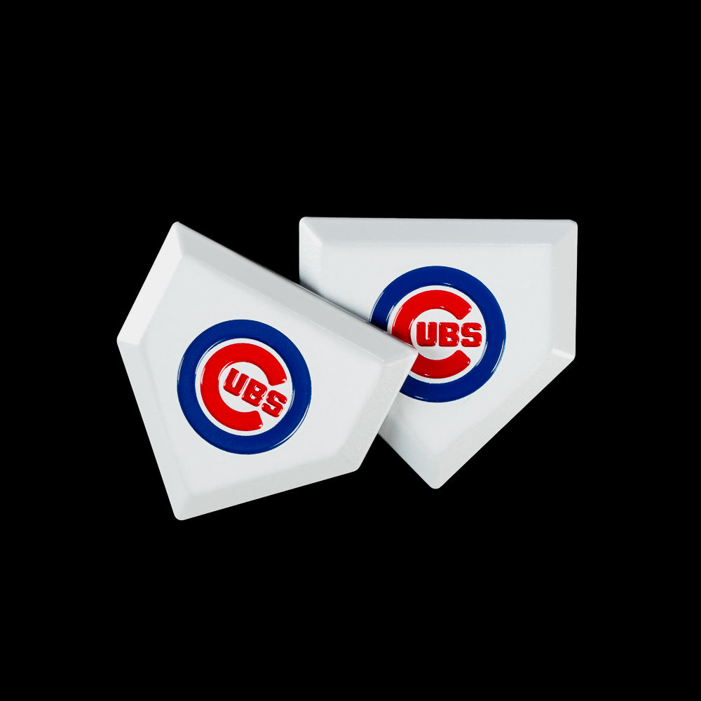 Chicago Cubs golf ball marker shaped like home plate featuring the classic Cubs logo in the center with a clean white design.
