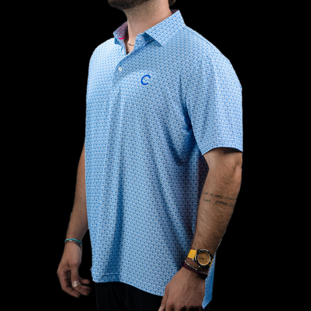 Side view of the Chicago Cubs Geometric Logo Classic Polo Shirt featuring the light blue all-over pattern.