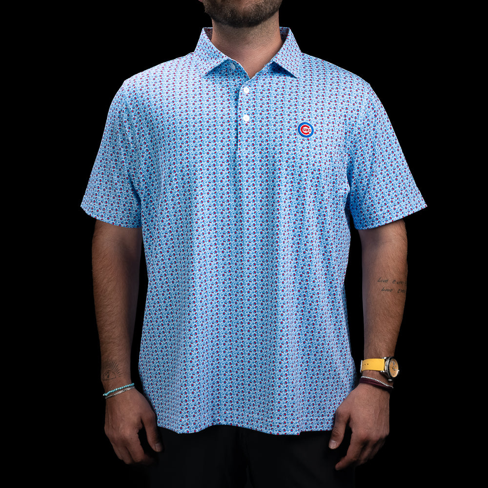 SWAG Golf Chicago Cubs World Champs Classic Polo Shirt in light blue with an all-over Cubs championship-inspired pattern and embroidered Cubs chest logo.