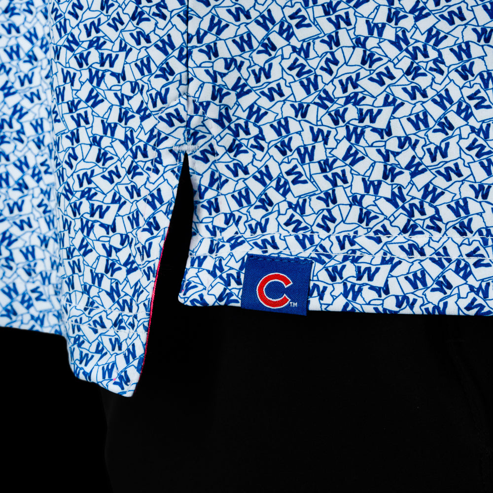 Close-up of the Chicago Cubs W Flag Classic Polo Shirt hem with Cubs logo tab.