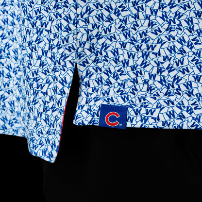 Close-up of the Chicago Cubs W Flag Classic Polo Shirt hem with Cubs logo tab.