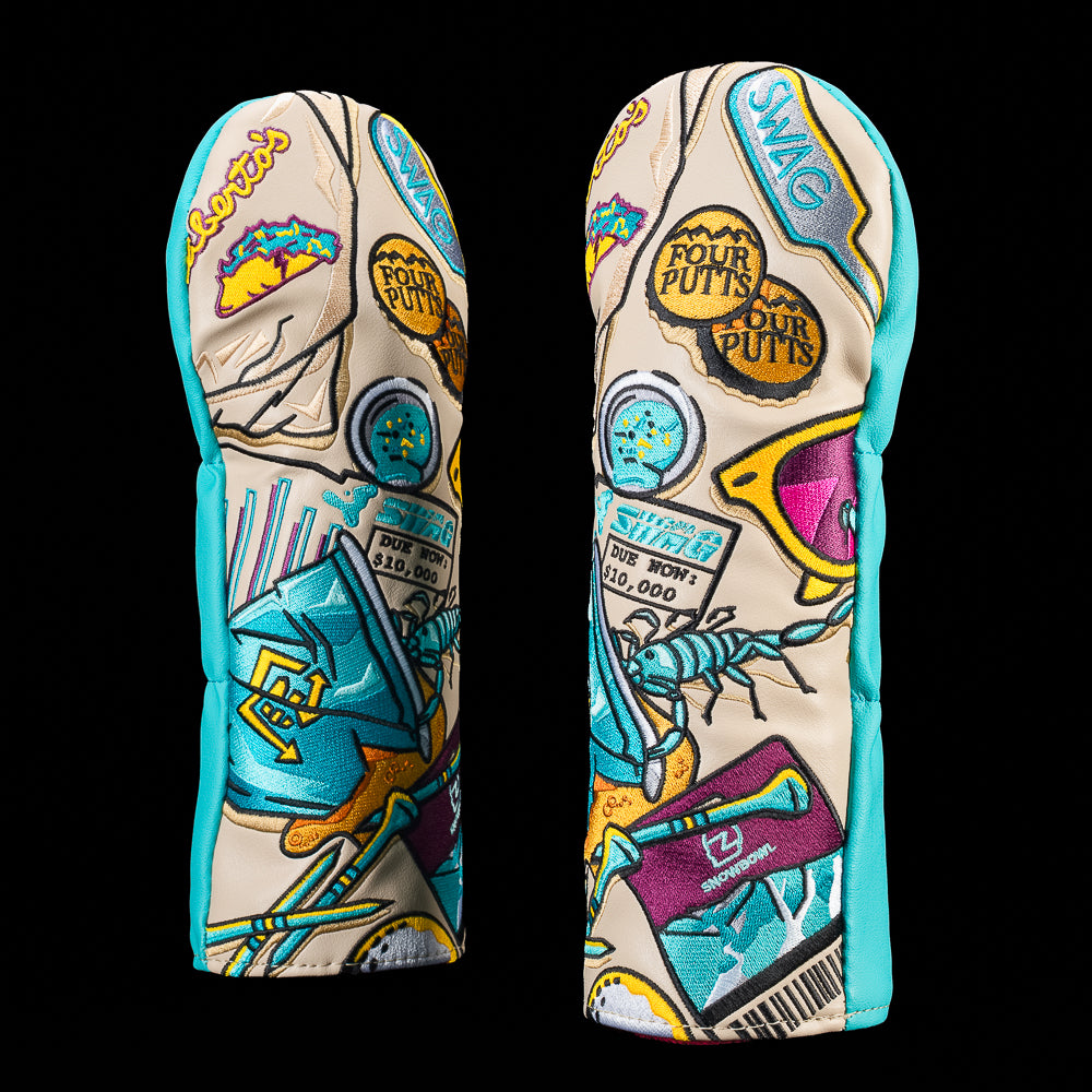 Arizona fairway wood cover featuring embroidered illustrations of tacos, desert mountains, bugs, travel stickers, and Arizona inspired outdoor icons on a cream background with turquoise side panels.