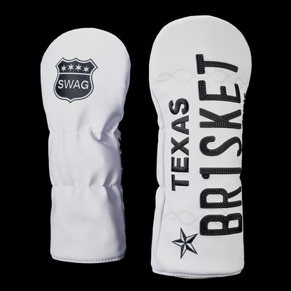Front and back views of the SWAG Golf Texas Brisket driver cover featuring oversized black "TEXAS BRISKET" lettering on a white background with the SWAG shield logo on the back.