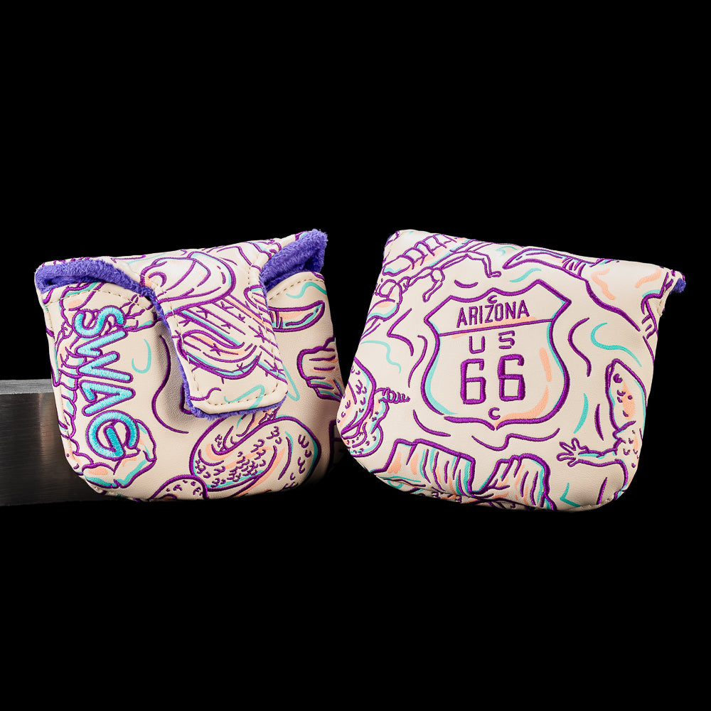 Arizona mallet putter cover featuring embroidered Route 66 highway shield artwork surrounded by saguaro cacti, desert wildlife, and canyon landscapes with SWAG branding in purple, teal, and cream.